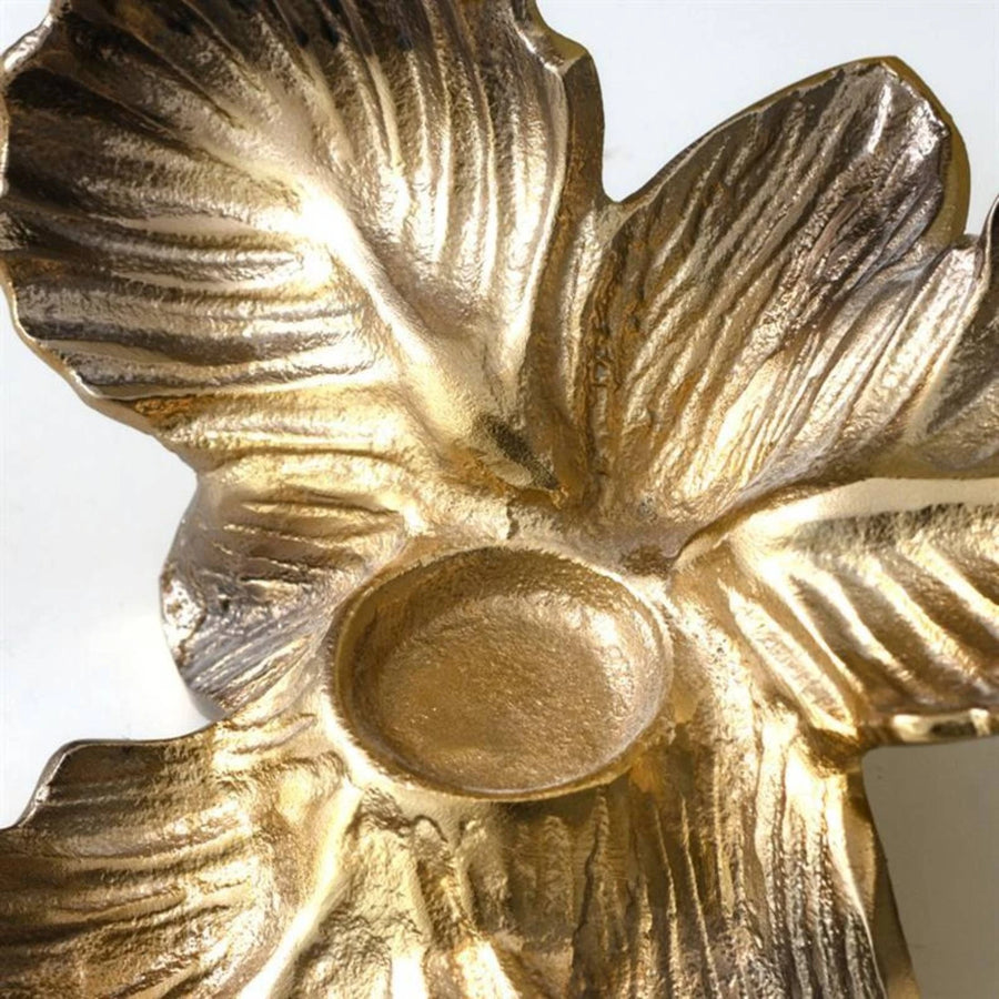 Goldener Blumen-Kerzenhalter mit Blütenblättern - Scheinraum.de
